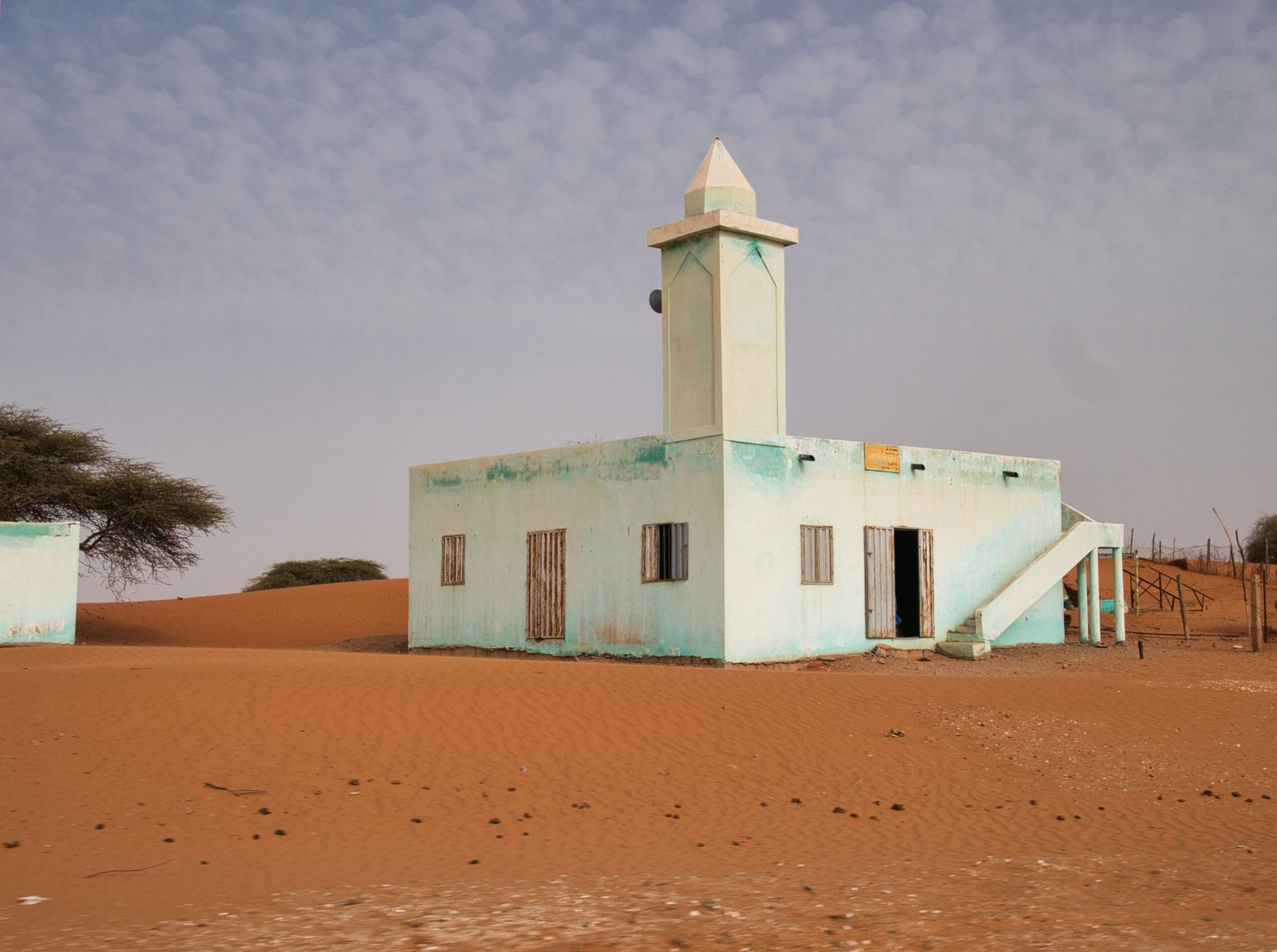 A small mosque located in middle of nowhere in Senegal, Africa.